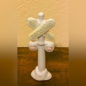 Retired Precious Moments Figurine.